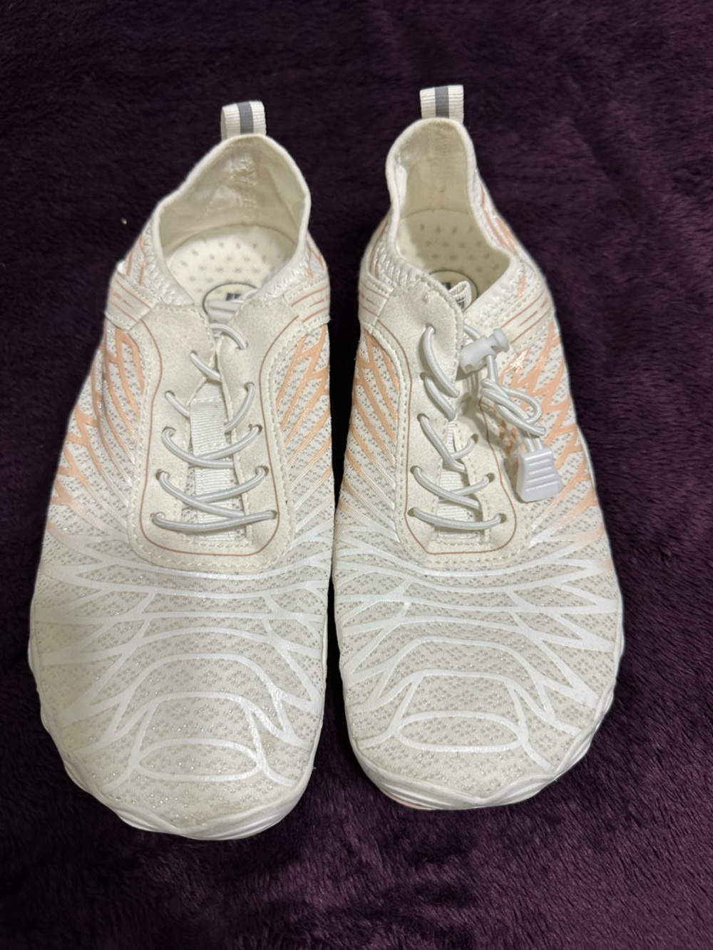 White Slip-On Athletic Sneakers with Subtle Peach Accents